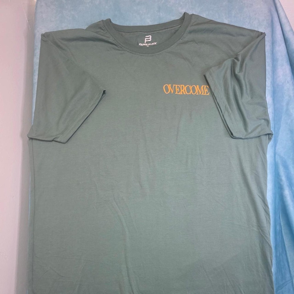 Faded Black Overcome T-shirt with orange text reading 'OVERCOME'